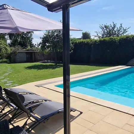 Апартаменты Dans Un Ecrin De Verdure Le Manoir (Calvados)